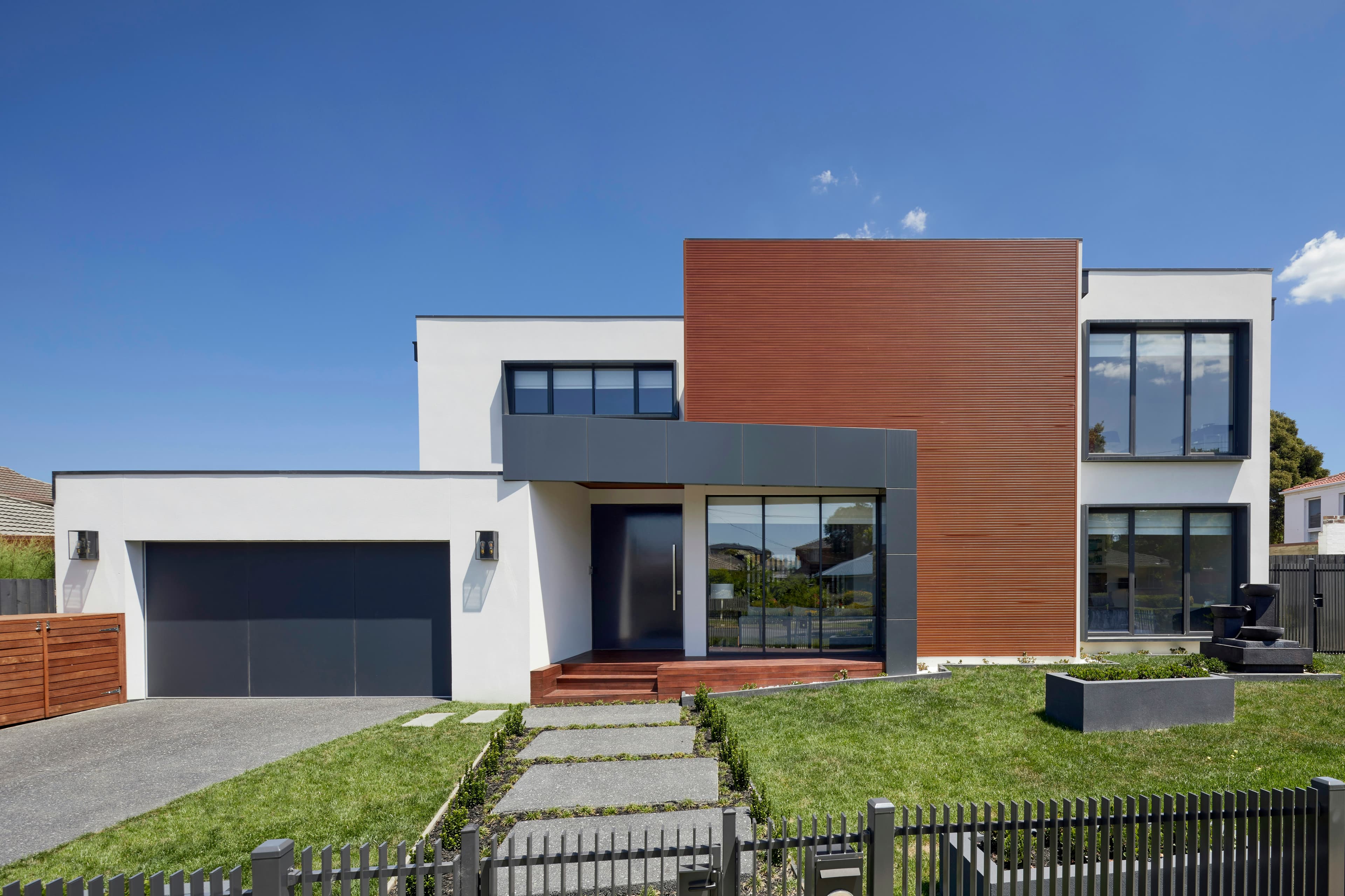 Contemporary courtyard residence in warm daylight